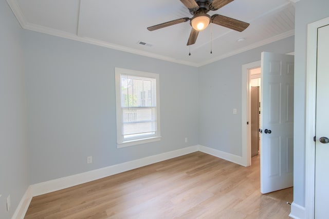 208 State St, Walterboro, SC 29488 - spare room with ornamental molding, light wood-style floors, ceiling fan, and baseboards