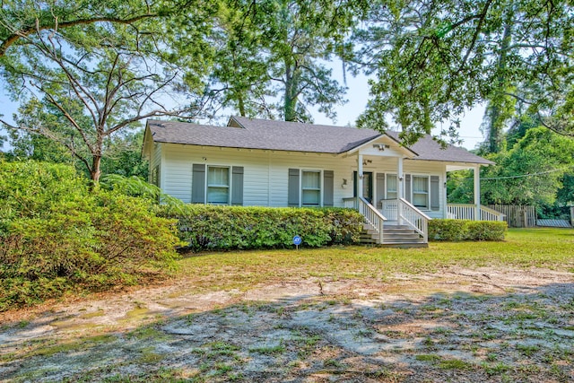 208 State St, Walterboro, SC 29488 - view of front of property featuring covered porch and roof with shingles