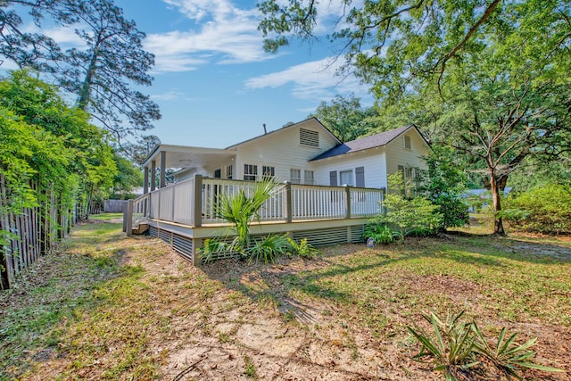 208 State St, Walterboro, SC 29488 - back of property with a wooden deck