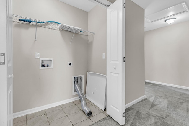 clothes washing area featuring hookup for a washing machine, light tile patterned floors, baseboards, hookup for an electric dryer, and laundry area