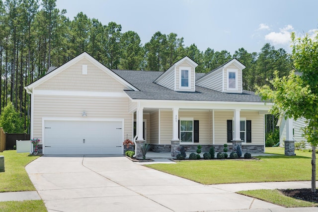 209 Country Gate Ln, Summerville, SC 29485 - view of front of home featuring covered porch, concrete driveway, an attached garage, stone siding, and roof with shingles