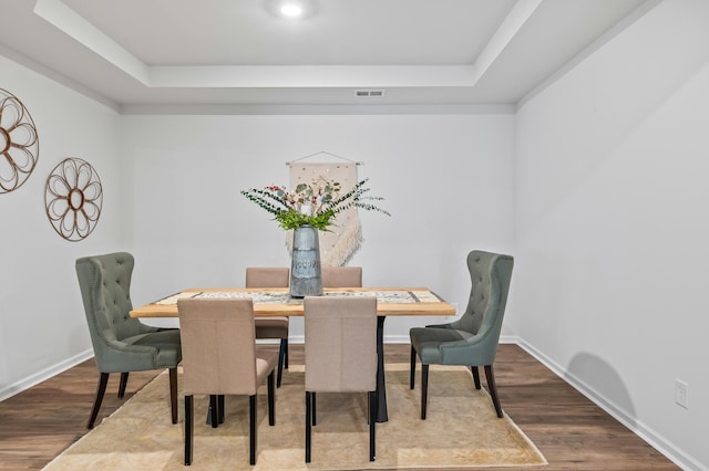 209 Country Gate Ln, Summerville, SC 29485 - dining room with wood finished floors, a raised ceiling, and baseboards