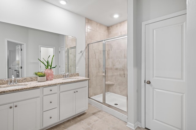 209 Country Gate Ln, Summerville, SC 29485 - bathroom featuring a stall shower, double vanity, recessed lighting, and tile patterned floors