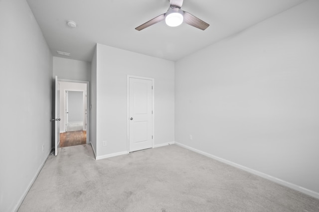 209 Country Gate Ln, Summerville, SC 29485 - unfurnished bedroom featuring baseboards, light carpet, and a ceiling fan