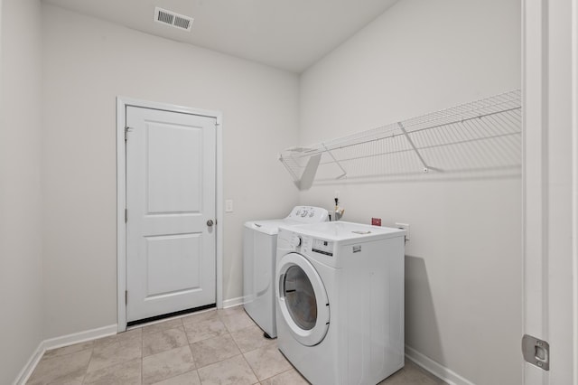 209 Country Gate Ln, Summerville, SC 29485 - laundry area featuring baseboards and separate washer and dryer