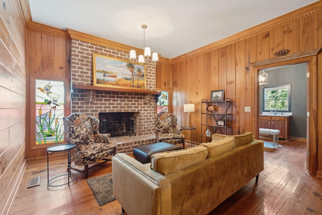 living room featuring wooden walls and hardwood / wood-style floors