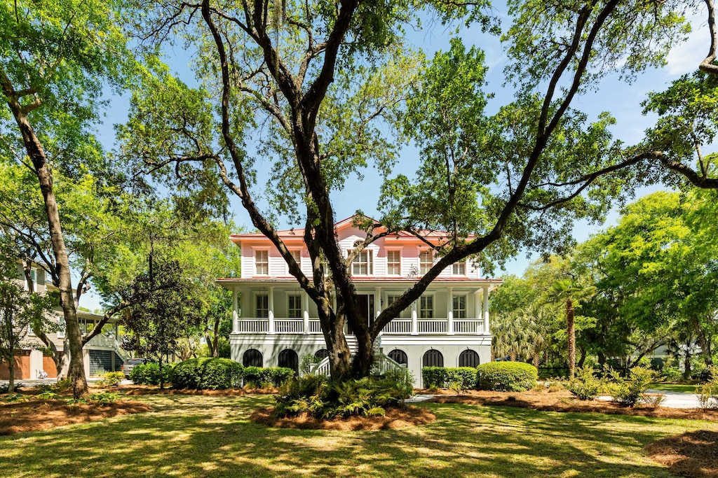 554 Parrot Point Dr, Charleston, SC 29412 - view of front of home with a balcony and a front yard