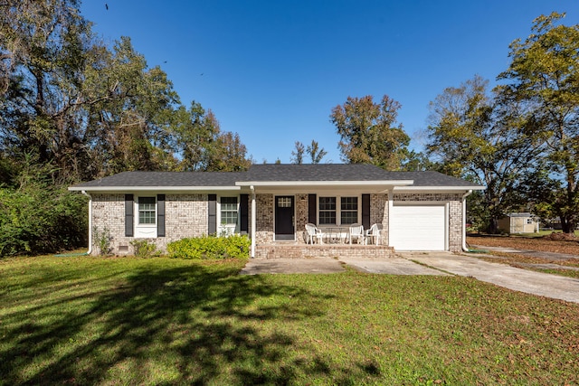 ranch-style house with a front lawn, covered porch, and a garage