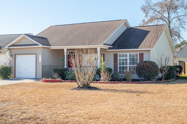 view of front facade featuring a garage and a front yard