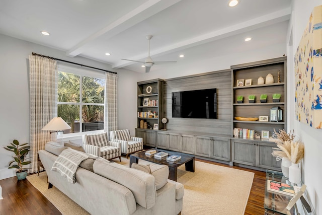 living room with dark wood finished floors, beam ceiling, ceiling fan, and recessed lighting