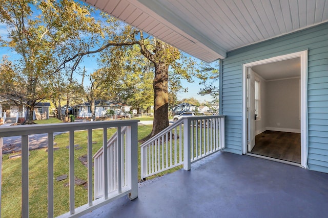 balcony with covered porch and a residential view