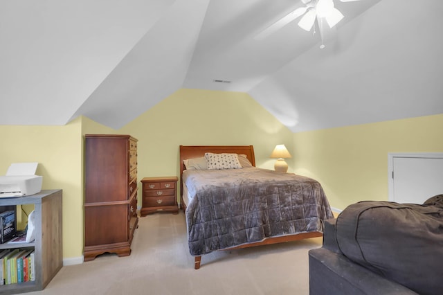 carpeted bedroom featuring ceiling fan, lofted ceiling, and baseboards