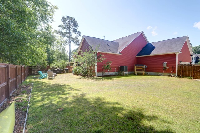 rear view of property with roof with shingles