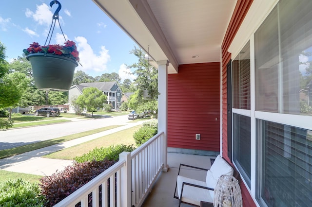 balcony featuring a porch