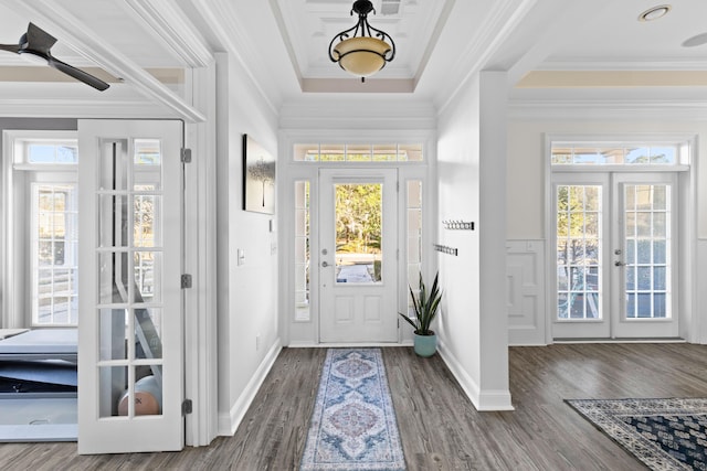 entrance foyer with ceiling fan, wood-type flooring, french doors, and crown molding