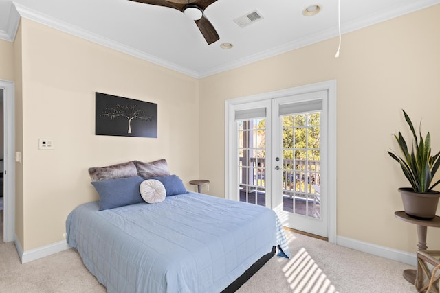 carpeted bedroom featuring crown molding, access to outside, ceiling fan, and french doors