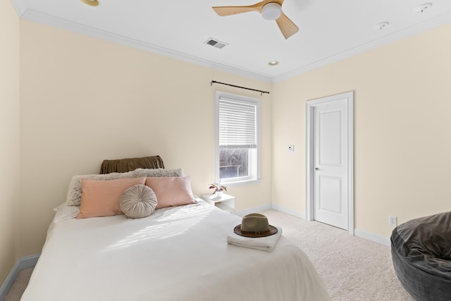 bedroom featuring crown molding, carpet, and ceiling fan