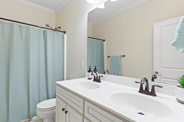 bathroom featuring ornamental molding, vanity, and toilet