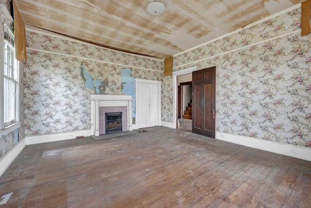 unfurnished living room with dark hardwood / wood-style floors