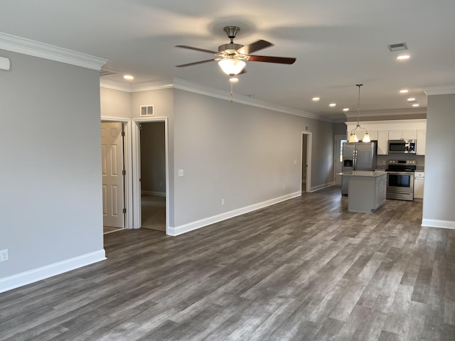 110A Dukes St, Saint George, SC 29477 - unfurnished living room with ceiling fan, recessed lighting, baseboards, dark wood-style flooring, and crown molding