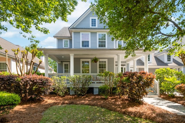 1977 Pierce St, Charleston, SC 29492 - view of front facade featuring a porch
