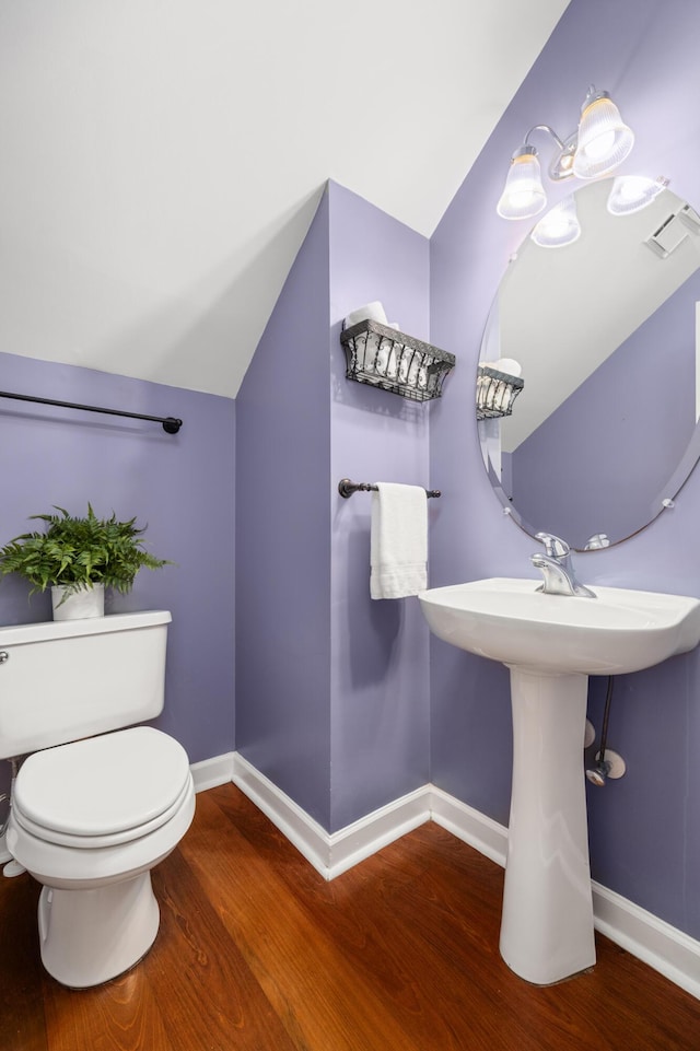 1977 Pierce St, Charleston, SC 29492 - bathroom with toilet, wood finished floors, baseboards, and visible vents