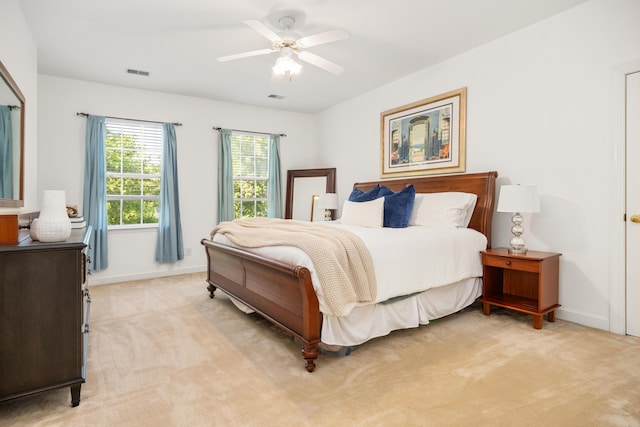 1977 Pierce St, Charleston, SC 29492 - bedroom featuring light colored carpet, baseboards, a ceiling fan, and visible vents