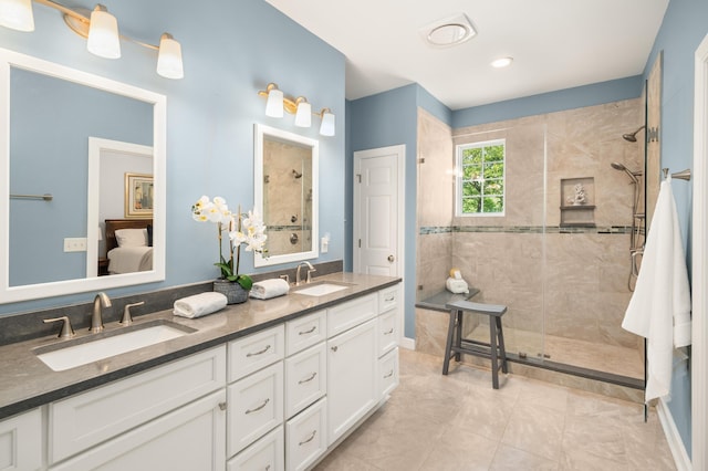 1977 Pierce St, Charleston, SC 29492 - full bathroom featuring tiled shower, double vanity, a sink, and tile patterned flooring