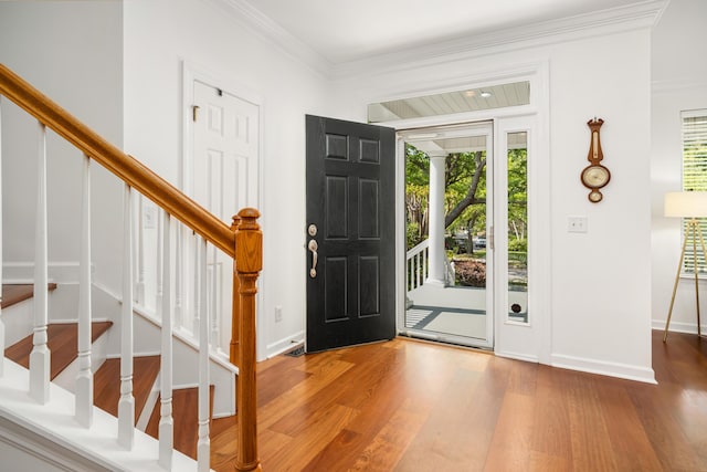 1977 Pierce St, Charleston, SC 29492 - foyer featuring crown molding, wood finished floors, baseboards, and stairs