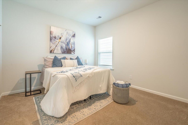 bedroom featuring carpet