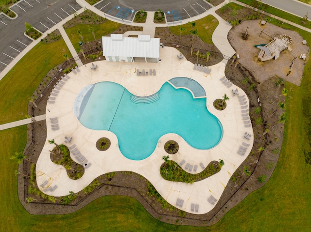 view of swimming pool featuring a patio area