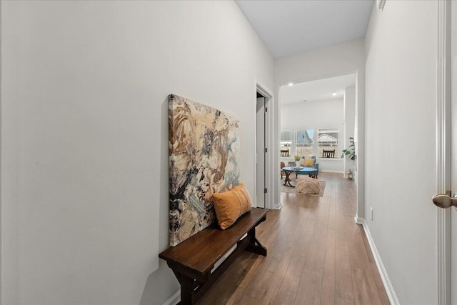 corridor featuring hardwood / wood-style floors