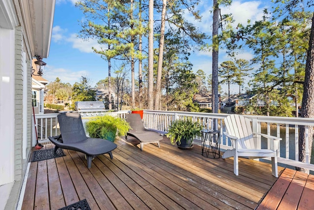 wooden terrace with grilling area