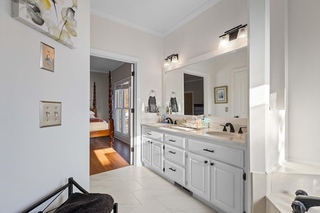 bathroom with vanity and crown molding