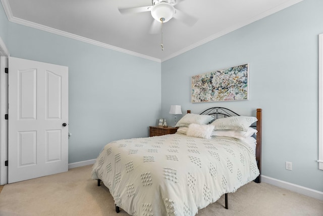 bedroom featuring light colored carpet, ceiling fan, and crown molding