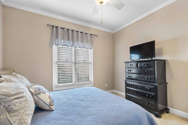 bedroom with ceiling fan, crown molding, and light carpet