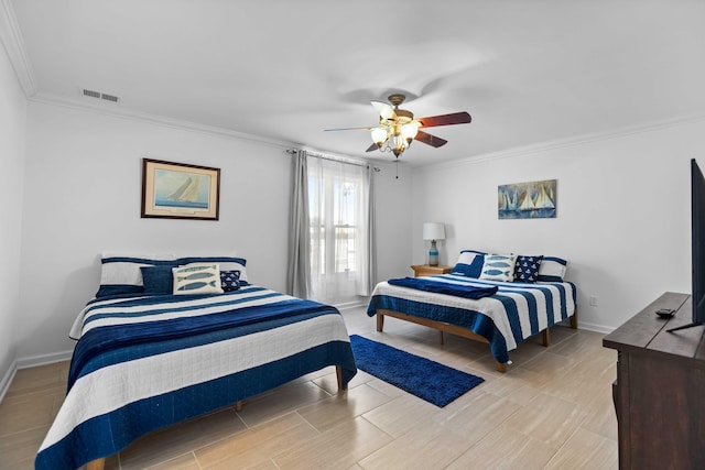 bedroom featuring ceiling fan and crown molding