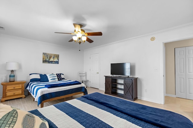 bedroom with ceiling fan and crown molding