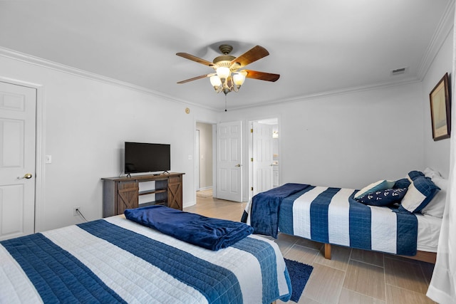 bedroom featuring ceiling fan and ornamental molding