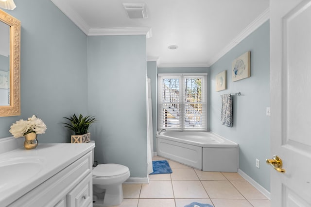 bathroom with a tub, tile patterned floors, toilet, vanity, and ornamental molding