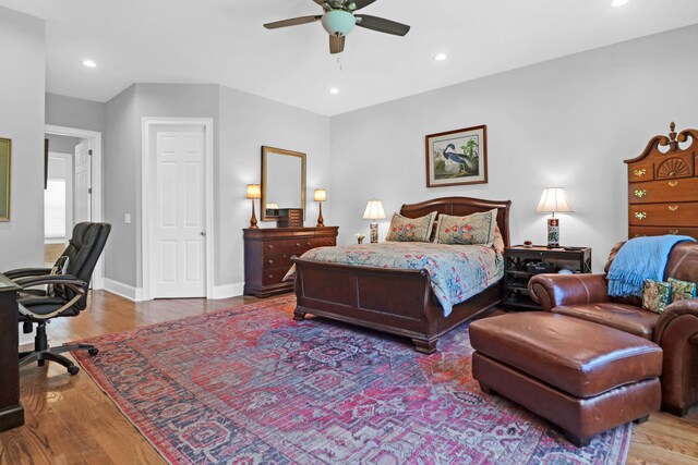 bedroom featuring ceiling fan and wood-type flooring