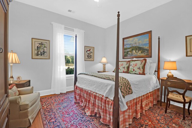 bedroom featuring hardwood / wood-style floors