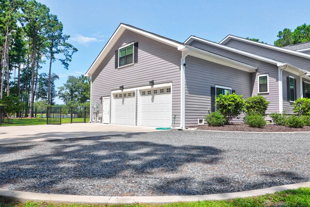 view of home's exterior with a garage