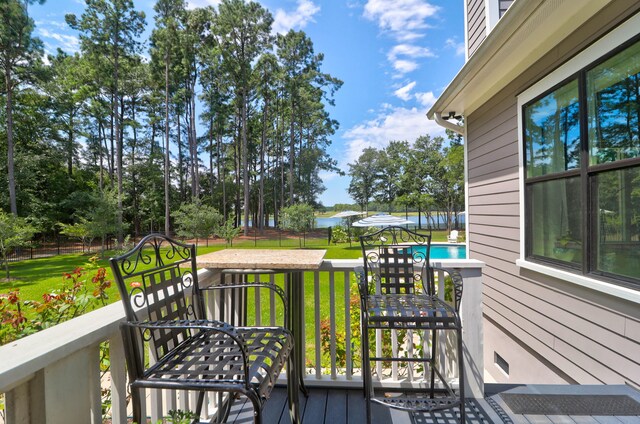 deck featuring a lawn