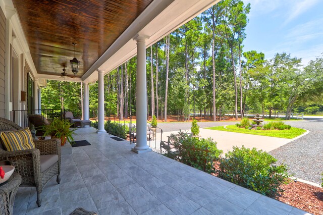 view of patio with ceiling fan and covered porch