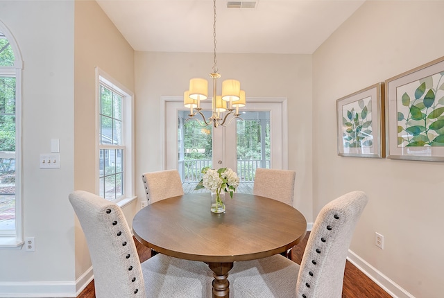 1148 Black Rush Cir, Mount Pleasant, SC 29466 - dining room with wood finished floors, baseboards, and a chandelier