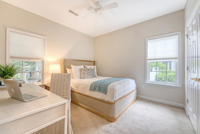1148 Black Rush Cir, Mount Pleasant, SC 29466 - bedroom with light colored carpet, baseboards, and a ceiling fan