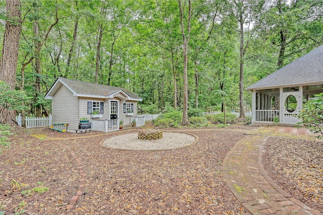 1148 Black Rush Cir, Mount Pleasant, SC 29466 - view of yard featuring a sunroom and a wooded view