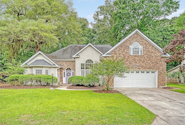 1148 Black Rush Cir, Mount Pleasant, SC 29466 - view of front of home featuring an attached garage, a front lawn, brick siding, driveway, and roof with shingles