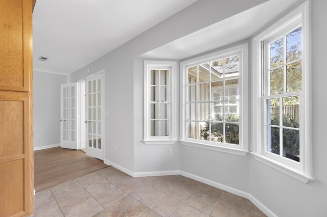 interior space with light tile patterned flooring